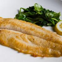 Catfish (8 Oz) · Pan seared served with sautéed spinach.