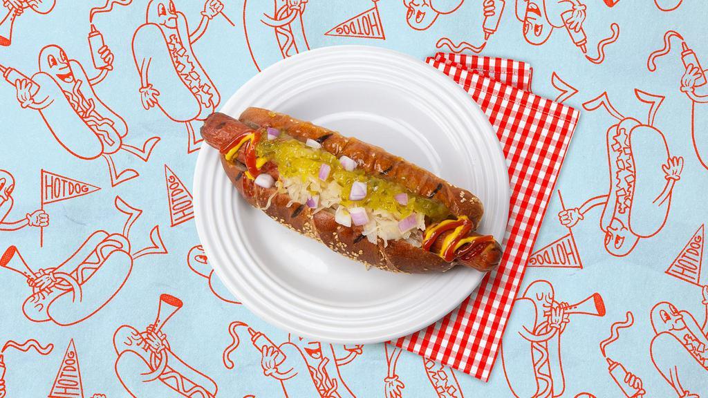 The New York Dog · Hot Dog topped with mustard, ketchup, sauerkraut, relish, and diced onion on a bun.