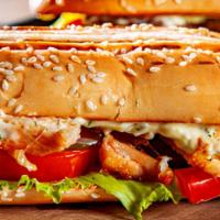 The Mexican Sandwich · Delicious Sandwich made with Grilled chicken, avocado, pepper jack cheese, jalapeños, and ch...