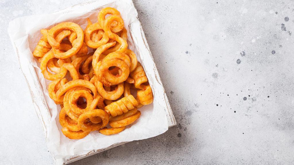 Curly Fries · Deep-fried crispy golden curly cut fries.