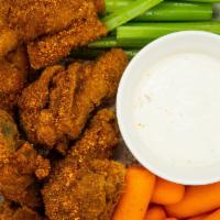 Chicken Wings (12 Pieces) · Fresh jumbo chicken wings, with choice of sauces -  buffalo, BBQ, chili Thai or plain.