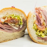 Classic Italian Sub Sandwich · Ham, Salami, Provolone, Lettuce, Tomato, Onion, Oregano, Oil, Vinegar