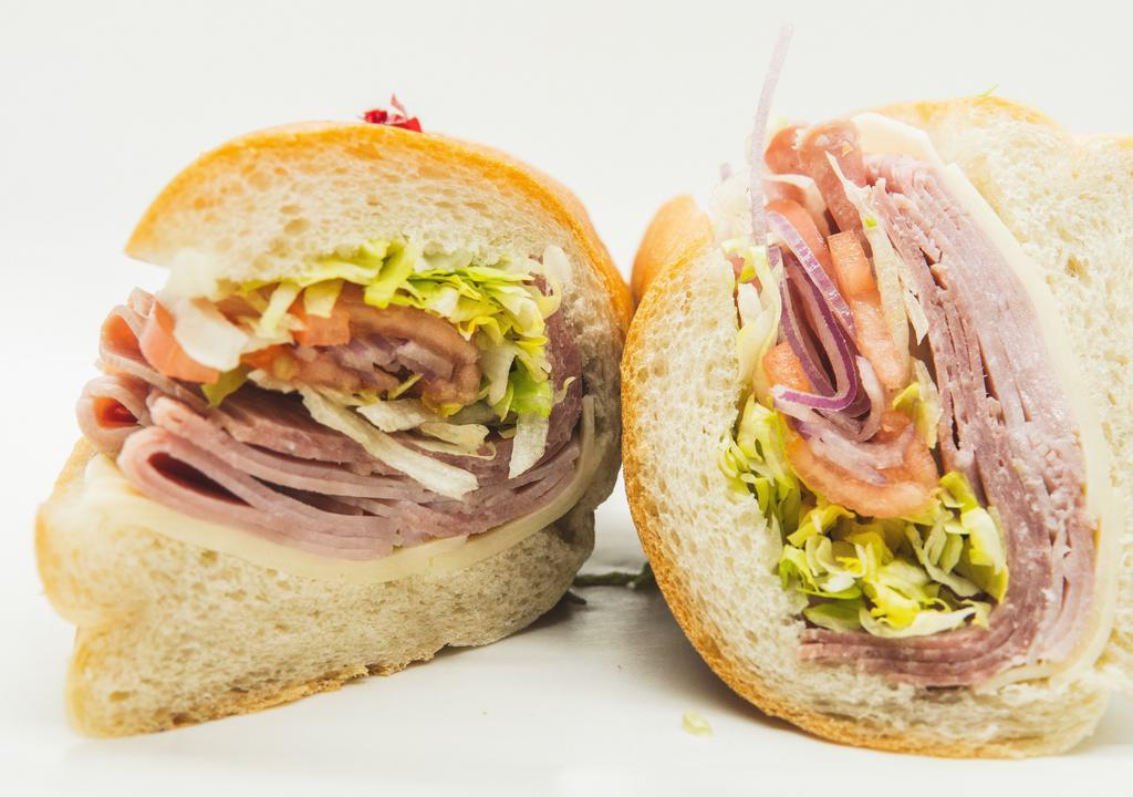 Classic Italian Sub Sandwich · Ham, Salami, Provolone, Lettuce, Tomato, Onion, Oregano, Oil, Vinegar