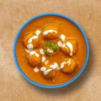 Cottage Cheese Treasure · Fried balls of potato and cottage cheese in a rich and creamy mild gravy with sweet onions a...