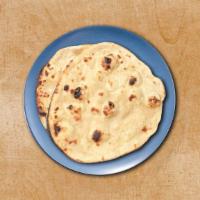 Og Tandoori Roti · An unleavened wholewheat flatbread baked in a clay oven. A perfect accompaniment to our entr...