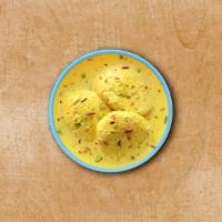 Supreme Rasmalai · Indian cottage cheese discs cooked in sugar syrup and later served with chilled thickened mi...