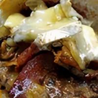 B5-Bacon And Brie · 6oz BURGER SERVED WITH APPLE-WOOD SMOKED BACON, MELTED BRIE, CARAMELIZED ONIONS,. BABY ARUGU...
