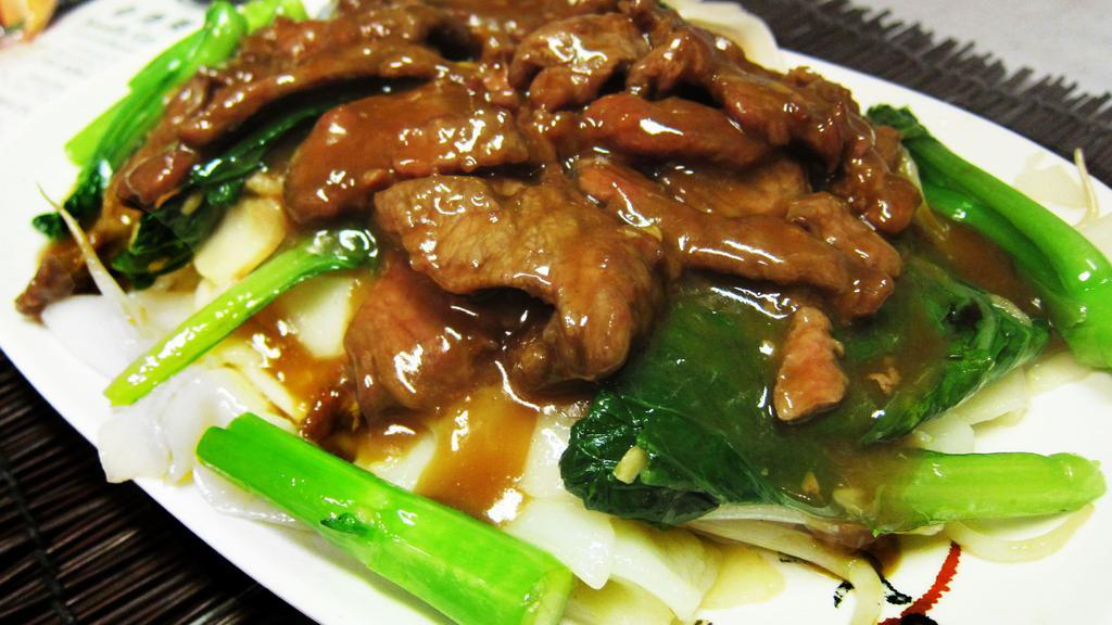 Beef With Chinese Vegetable Over Chow Fun · In brown bean sauce over chow fun.