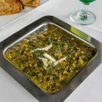 Palak Kofta · Paneer cheese cooked with spinach in a thick creamy sauce.
