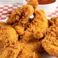 Honey Bbq Chicken Tender Basket With Onion Rings · Delicious chicken tenders, tossed in Honey BBQ sauce, and fried to perfection. Served on a b...