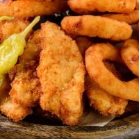 Mild Chicken Tender Basket With  Onion Rings · Delicious chicken tenders, tossed in Mild hot sauce, and fried to perfection. Served on a be...