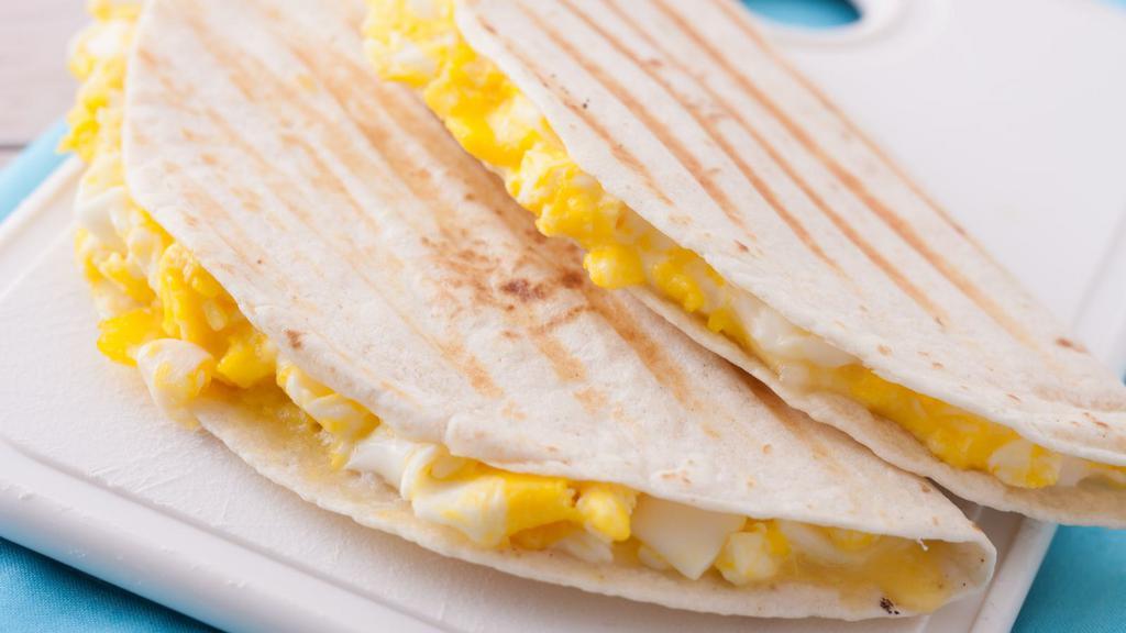 Egg Wrap · Fresh Breakfast wrap filled with scrambled eggs, American cheese, and customers choice of meat.