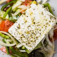 Horatiki (Peasant) Salad · Beefsteak tomatoes, cucumbers peppers, olives, hotos feta cheese, stuffed grape leave, EVOO ...