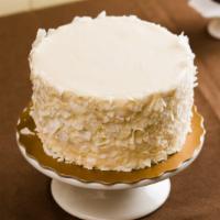 Coconut Cloud - 6 Inch · coconut layers with dreamy white frosting covered in coconut chips - serves 6 to 10