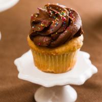 The M Cupcake · vanilla batter with chocolate frosting