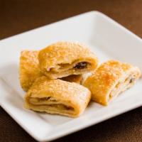 Rugelach Apricot Bag · Sweet dough wrapped around just the right amount of raisins, walnuts and jam - 10 pieces
