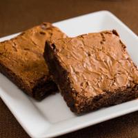 Brownie · An indulgent, no-holds-barred brownie studded with belgian chocolate chips.