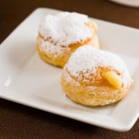 Creme Puff · our version of a donut hole filled with creamy custard