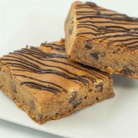 Blondie · These soft and chewy squares are everything you want a blondie to be. The chocolate chips ma...