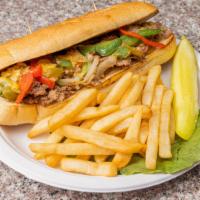Original Philly Cheese Steak · Served with sliced onions, chopped bell pepper and melted mozzarella on a hero