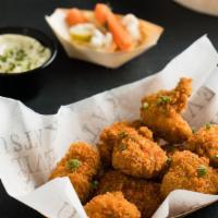 8 Piece Pork Bites · Comes with pickles and choice of sauce.