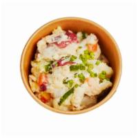 Potato Salad · 8 oz. red potatoes, usukuchi, pickled mustard seeds, cucumber, corn, and carrots.