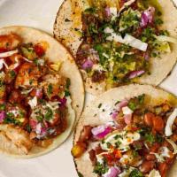 Mix & Match Tacos · Create your own personalized taco meal! Select as many as three Tributo Tacos and add your f...