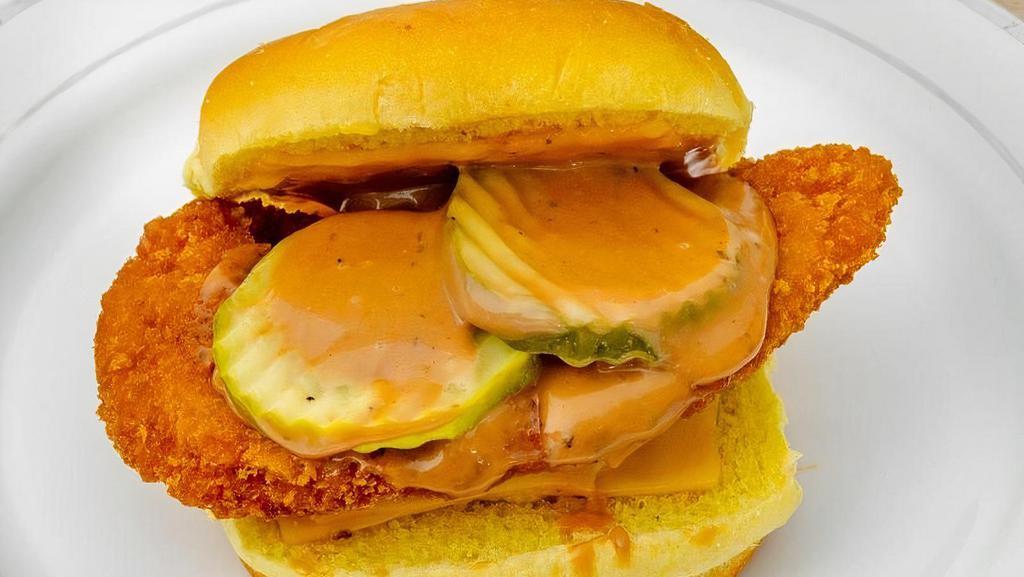 Crispy Chicken Sandwich · Crispy chicken with cheese, city sauce and pickles.