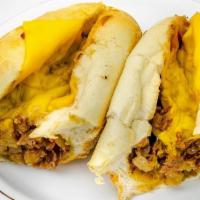 Philly Cheesesteak Sandwich · Served with cheese, peppers and onions