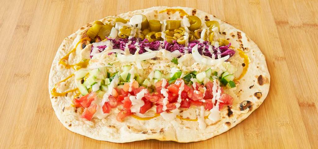 Veggie Pita · Hummus, regular salad (lettuce, tomato, cucumber), cabbage salad and spicy Turkish salad (tomatoes, onions and roasted red pepper).