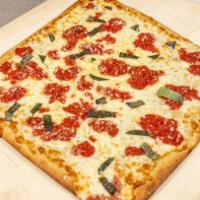 Grandma Pizza · Square pie, mozzarella, plum tomato sauce, pecorino, oregano.