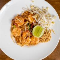 Pad Thai · Thin rice noodles sauteed with tofu, scallion, egg, bean sprouts and crushed peanuts with dr...