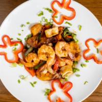 Seafood Pad Cha - “Thai Ocean” · Extra Spicy. Shrimp, squid and slices of fish filet sautéed in a spicy sauce and dressed wit...