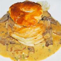 Mushrooms Vol-Au-Vent · Delectable pan-fried wild mushrooms in a delicate puff pastry.