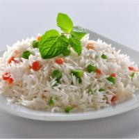 Rice & Peas · Fluffy steamed rice with green peas.