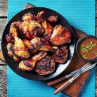 Jerk Chicken · Flavorful, juicy pieces of jerk chicken marinated and seasoned with fresh herbs, spices, bre...