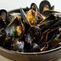 Island Steamed Mussels · Scotch bonnet, tomato, coconut broth.