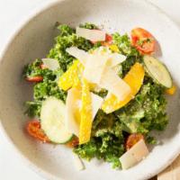 Kale Salad · Vegetarian & vegan. Cherry tomatoes, cucumbers, mango vinaigrette, parmesan.