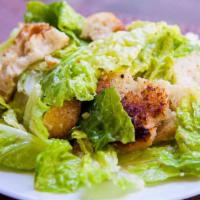 Caesar Salad · Vegetarian & vegan. Shaved Parmesan, herb croutons, not your average dressing.