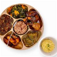 D’ Roundabout (Serves 2) · Oxtail, curry goat, jerk chicken, rice & peas, pumpkin rice, fried plantains and collard gre...