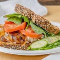 Sandwich #4 Tuna Salad* · Tuna salad with mayonnaise, caramelized onions, fresh tomato & avocado on multi-grain sl...