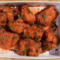 Hot Honey Thigh (8 Pc) · 8 piece crunchy chicken thighs drizzled with Hot Honey Sauce, dusted with Carolina Reaper fl...
