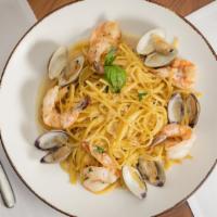 Shrimp Scampi With Clams · Large, wild-caught shrimp, and clams in shell prepared in scampi sauce (garlic, butter and o...