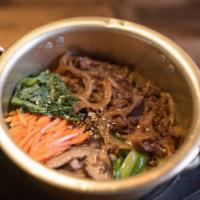 Bulgogi Bowl (Beef) · Traditional Korean ribeye rice bowl with shiitake mushrooms, carrots, zucchini. Served with ...