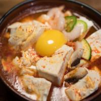 Soon Dubu Soup · Spicy. Choice of flavor. Spicy soft tofu soup with side of rice and kimchi.
