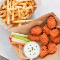 #2. Nine Crispy Boneless Wings Combo · Served with carrot & celery sticks, fries and dipping sauce.