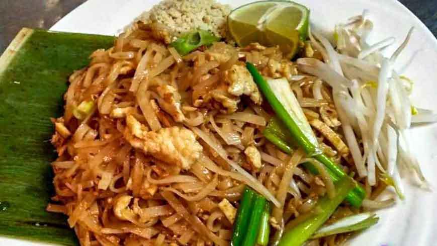 Pad Thai · Spicy. Stir-fried Thai noodles with egg, bean sprouts, dry tofu, topped with ground peanuts.
