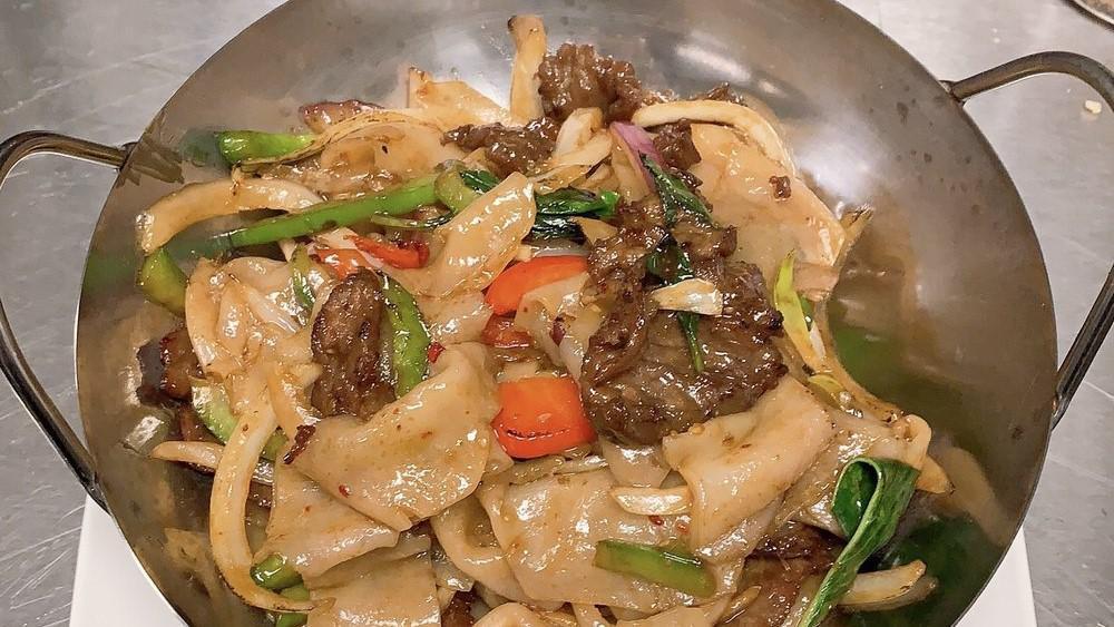 Drunken Noodle · Spicy. Spicy stir-fried broad rice noodle with basil, onion, bell pepper.