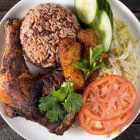 Jerk Chicken Meal · Chicken marinade in Jamaican Jerk Sauce, served with Rice & Peas or Basmati Rice, Tomatoes, ...