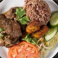 Jerk Pork Meal · Slowly cooked Boneless Pork in Jamaican Jerk Seasoning, served over Rice & Peas or Basmati R...